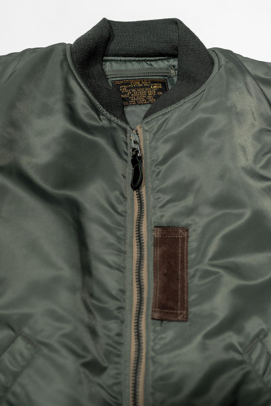 Buzz Rickson's BR14920 Type MA-1 Jacket in Green - Laying flat, front view close-up