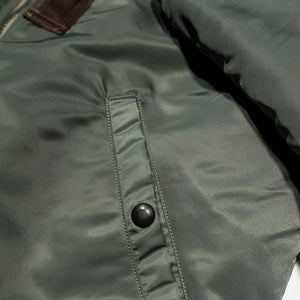 Buzz Rickson's BR14920 Type MA-1 Jacket in Green - Laying flat, close-up on pocket