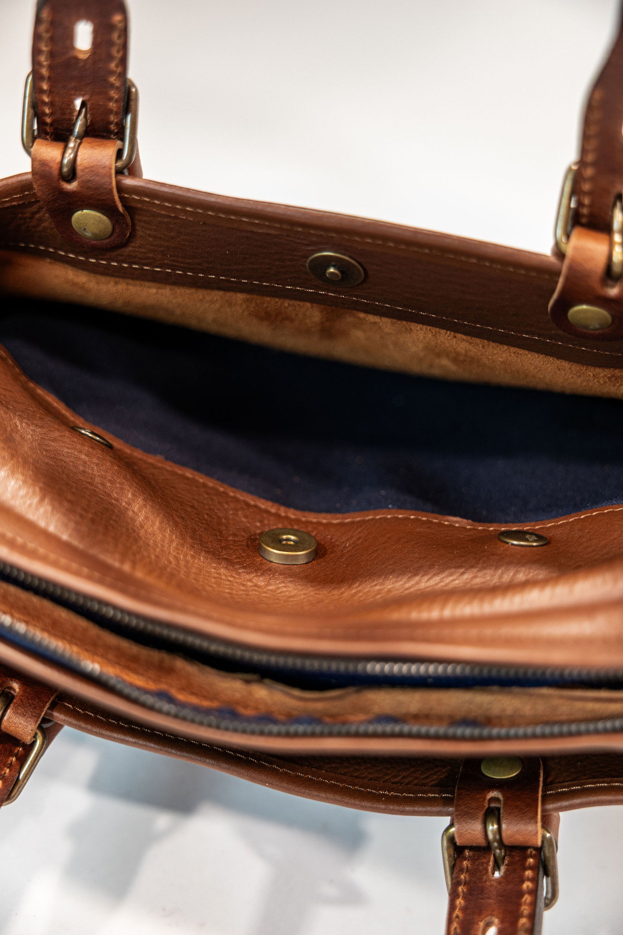 Bleu de Chauffe Folder Business Bag - Amber Brown. close up shot of second bag opening