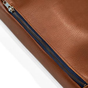Bleu de Chauffe Folder Business Bag - Amber Brown. close up of zipper on bottom of bag