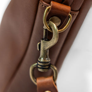Bleu de Chauffe Folder Business Bag - Amber Brown. detail shot of side clasp