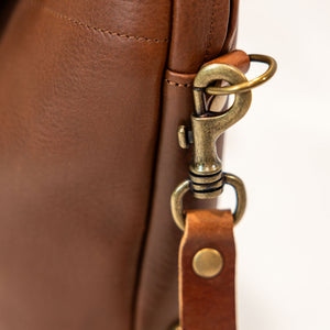 Bleu de Chauffe Folder Business Bag - Amber Brown. detail shot of side clasp
