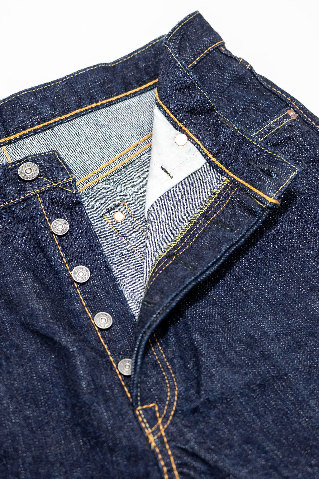 Pure Blue Japan XX-002 Piped Straight - Indigo. close up of buttons undone
