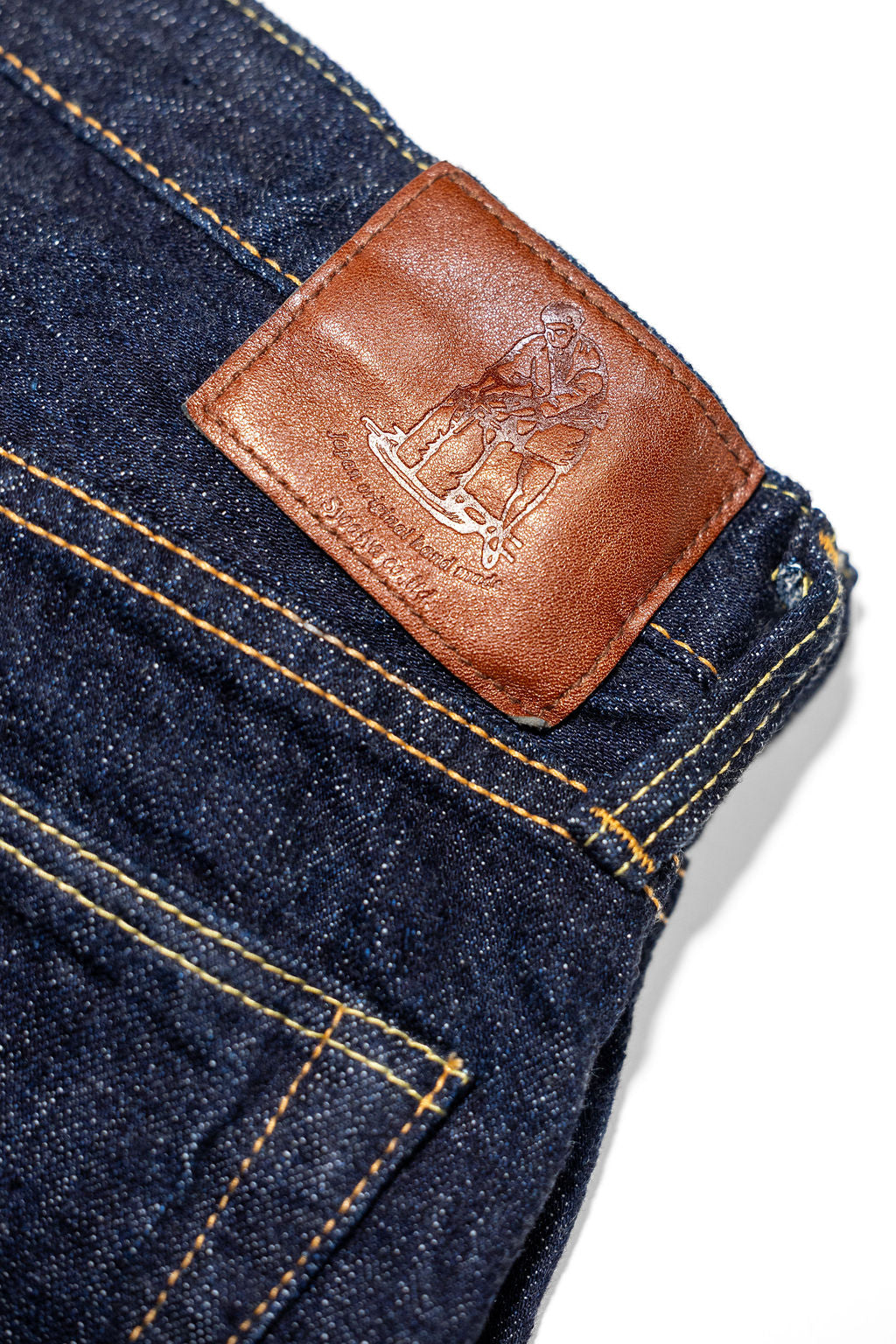 Pure Blue Japan XX-002 Piped Straight - Indigo. close up of patch design
