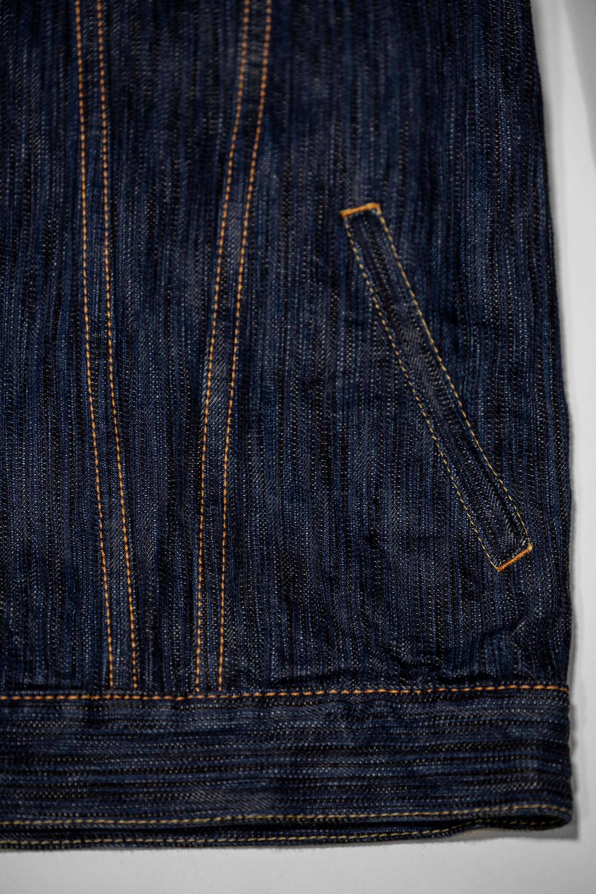 Pure Blue Japan 6226-L 14.5oz Waterfall Denim Type III Jacket - Light Indigo. close up of bottom front pocket