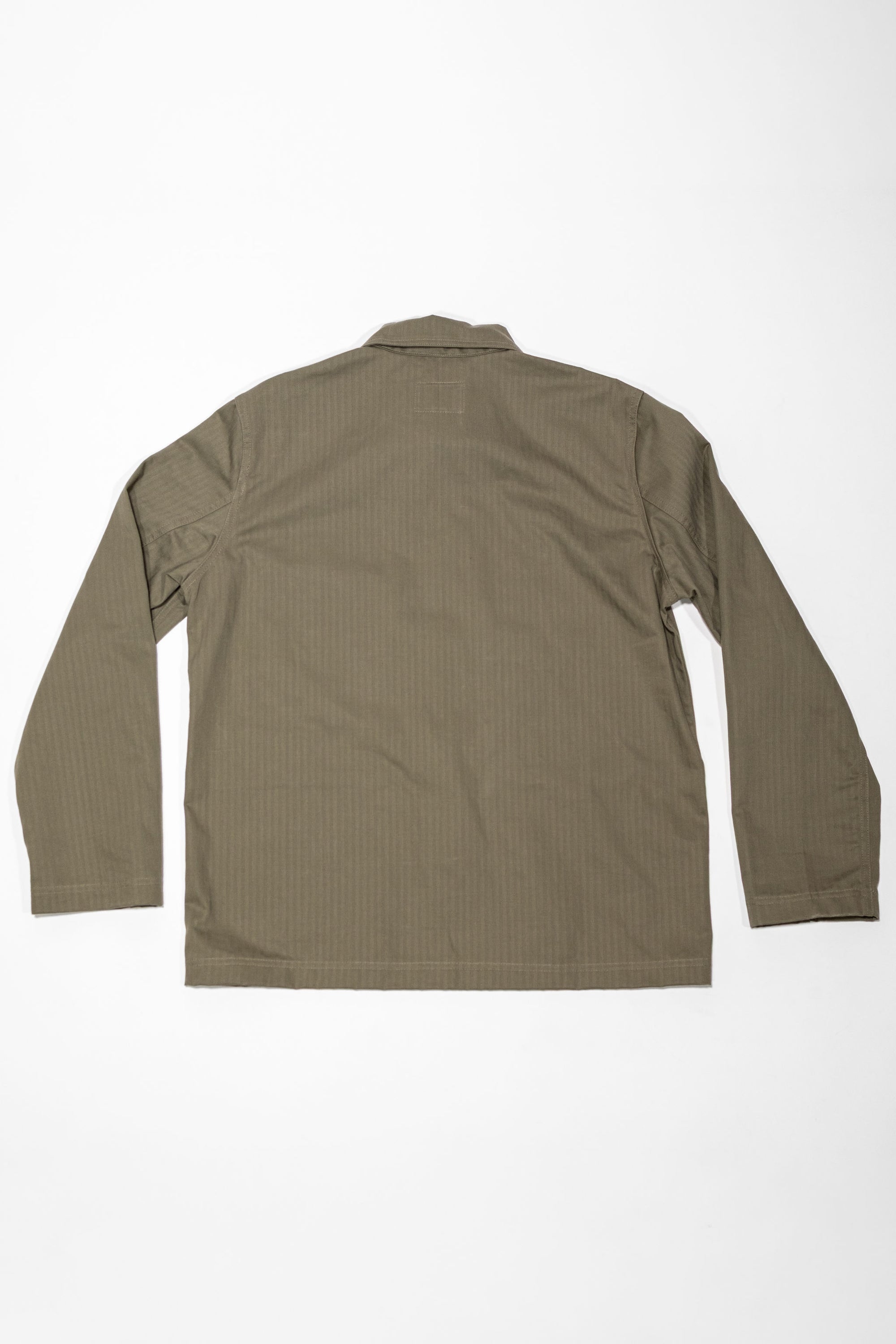 Dehen 1920 Chore Coat - Sage Dry Waxed Cotton. laid on front