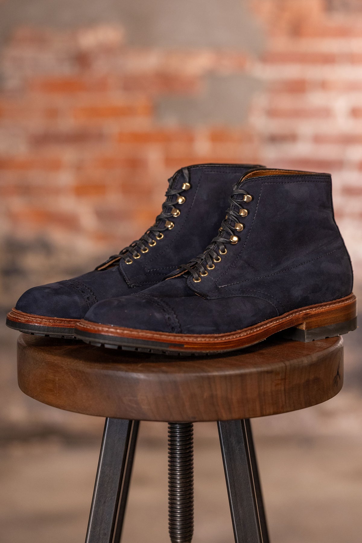 Navy blue suede cap toe boots front / side view