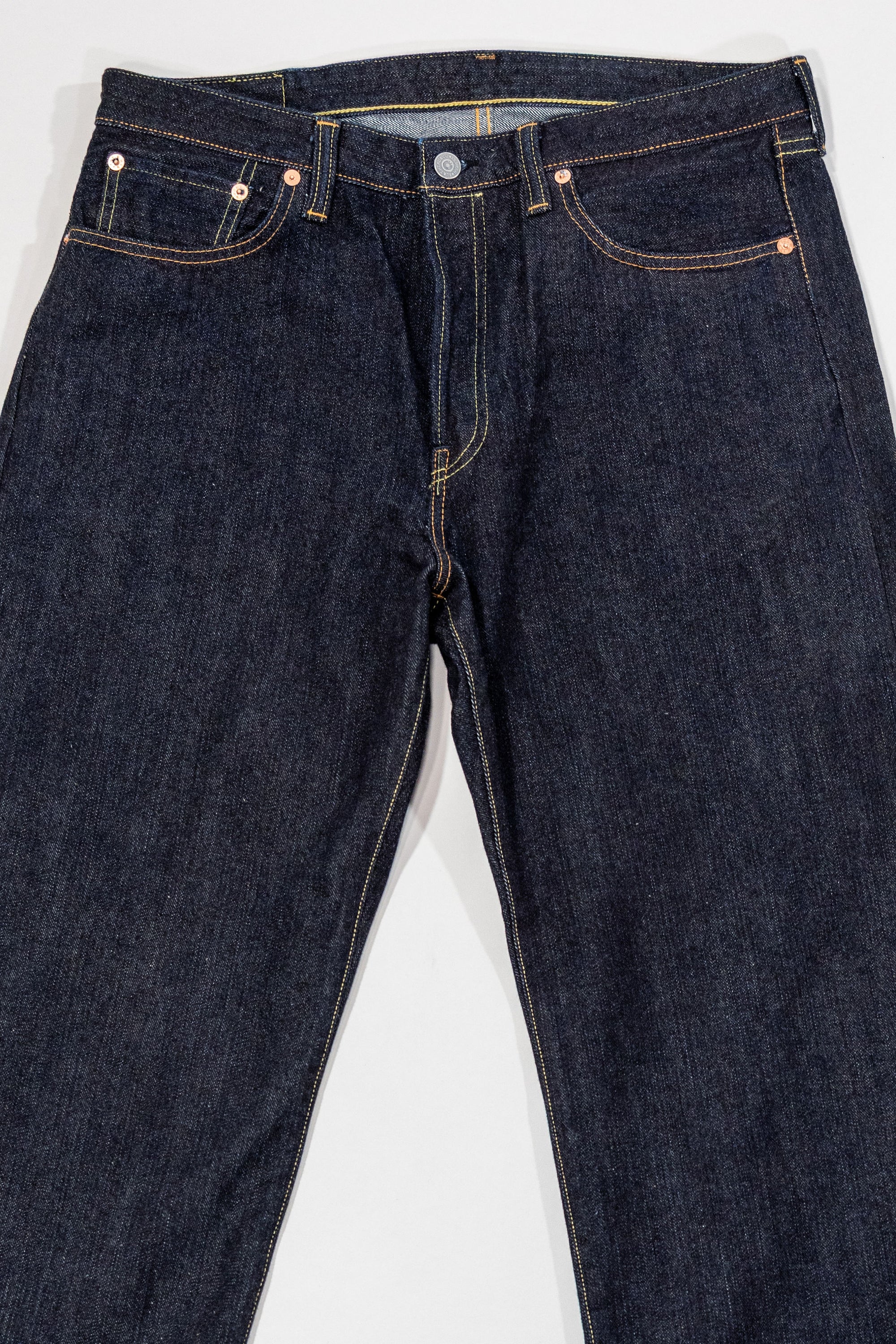 Indigo denim jeans wide cut front view laying flat