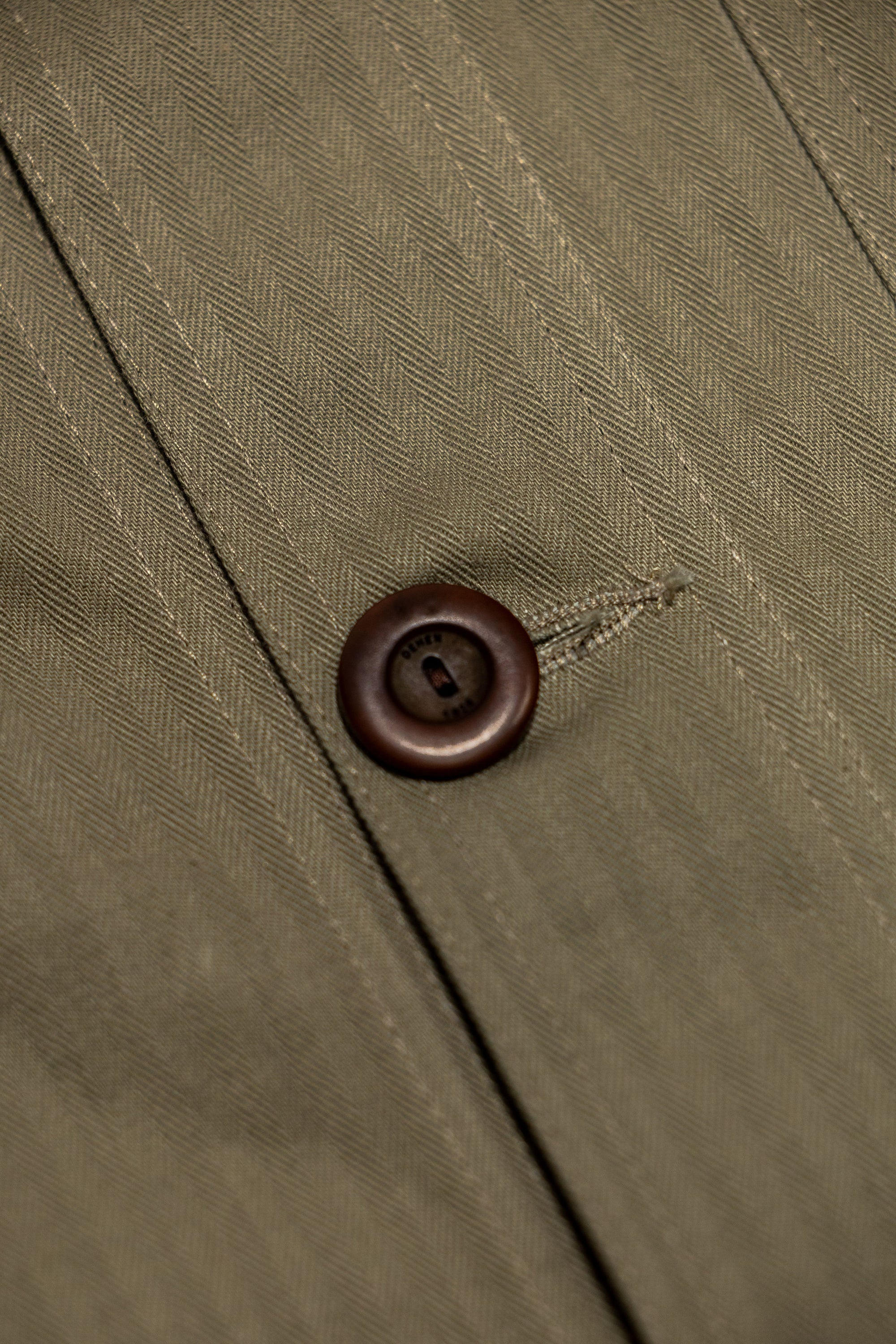 Dehen 1920 Chore Coat - Sage Dry Waxed Cotton. close up of button detail