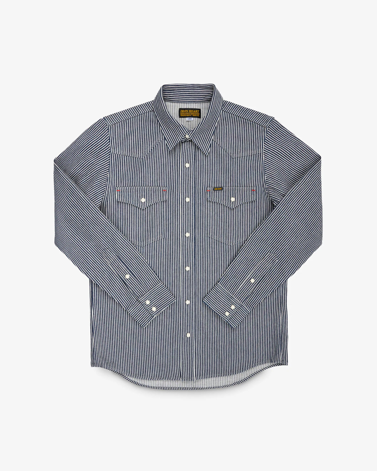 Western style shirt with indigo and white thin vertical stripes and white snaps front view laying flat