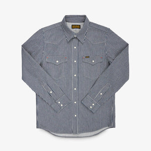 Western style shirt with indigo and white thin vertical stripes and white snaps front view laying flat