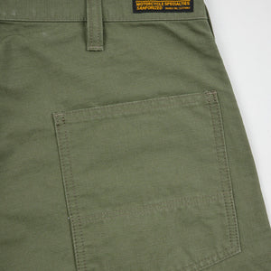 Olive pants back view laying flat closeup on pocket