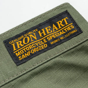 Olive pants laying flat closeup on Black/Yellow Iron Heart logo