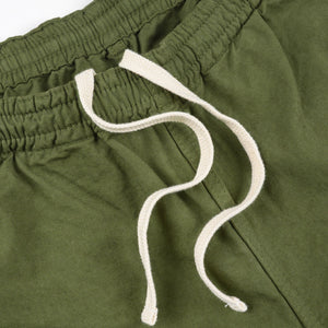 Olive mid length shorts laying flat closeup on white drawstring