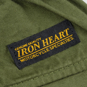Olive mid length shorts back view laying flat closeup on black/yellow Iron Heart logo