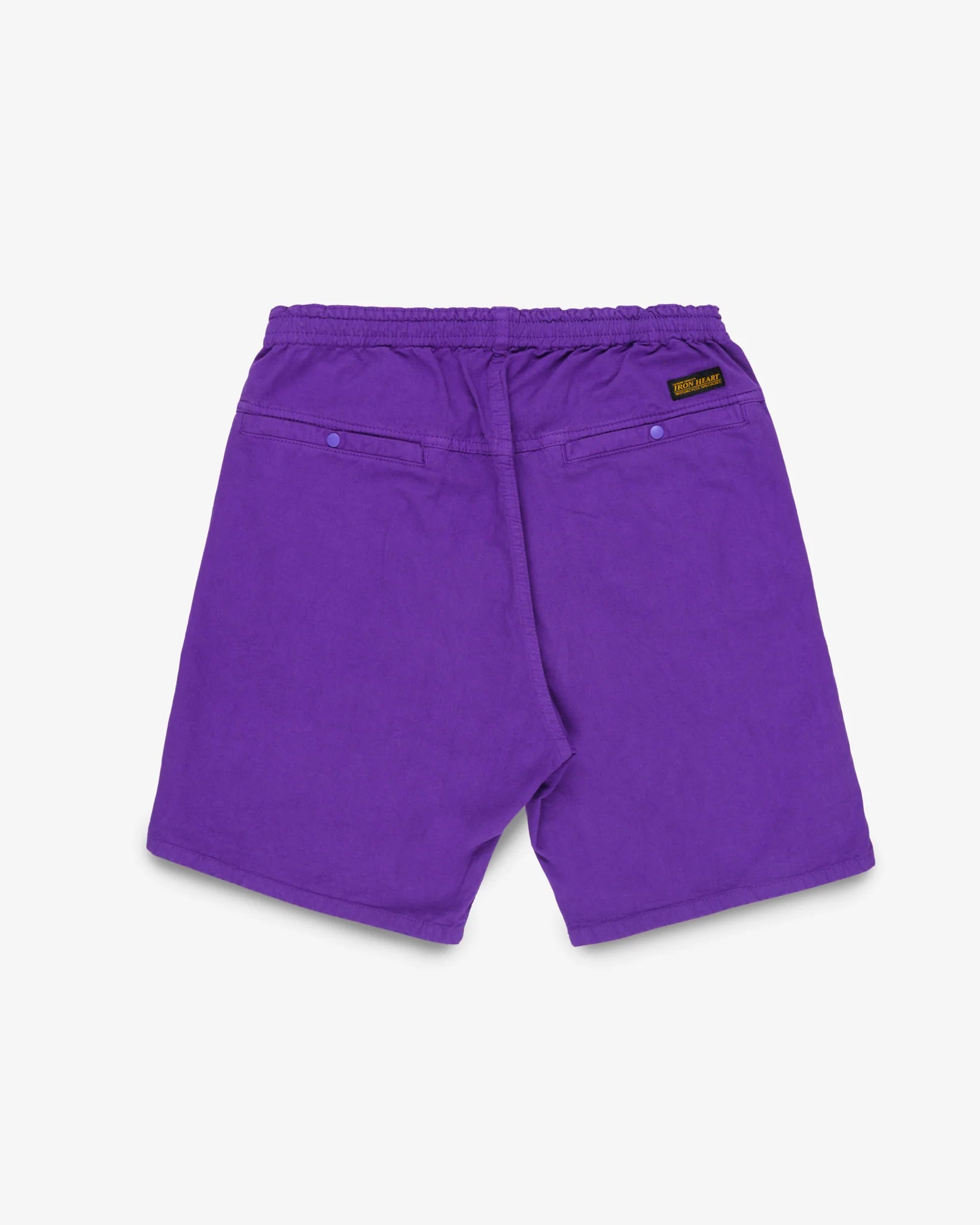 Purple mid length shorts back view laying flat