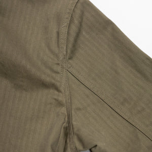 Dehen 1920 Chore Coat - Sage Dry Waxed Cotton. close up of shoulder detail
