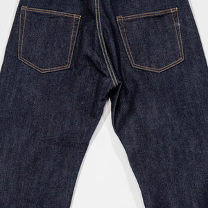 Indigo denim jeans wide cut back view laying flat