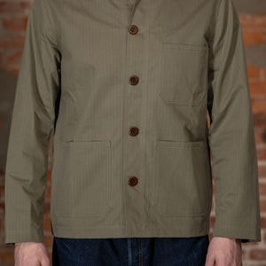 Dehen 1920 Chore Coat - Sage Dry Waxed Cotton. on model front profile