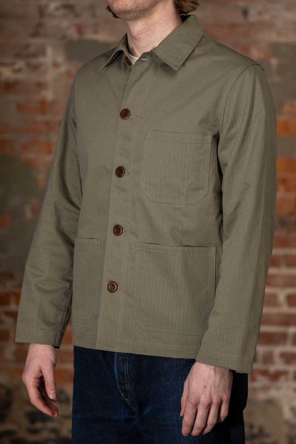 Dehen 1920 Chore Coat - Sage Dry Waxed Cotton. on model side profile