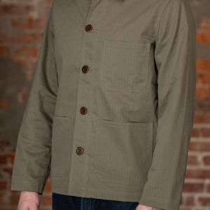 Dehen 1920 Chore Coat - Sage Dry Waxed Cotton. on model side profile