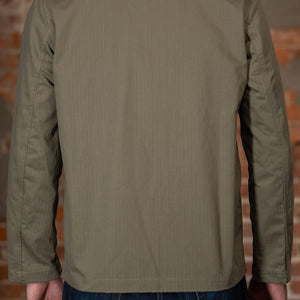 Dehen 1920 Chore Coat - Sage Dry Waxed Cotton.  on model back profile