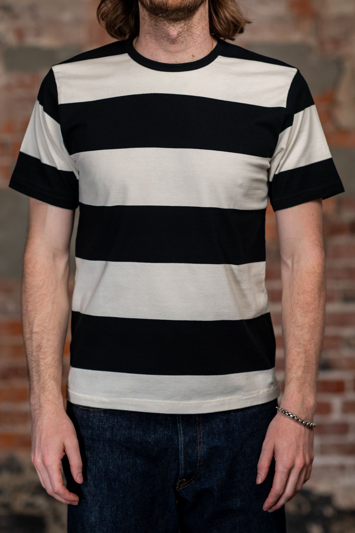 Freenote Cloth Mooch Tee - Black Stripe. on model front profile