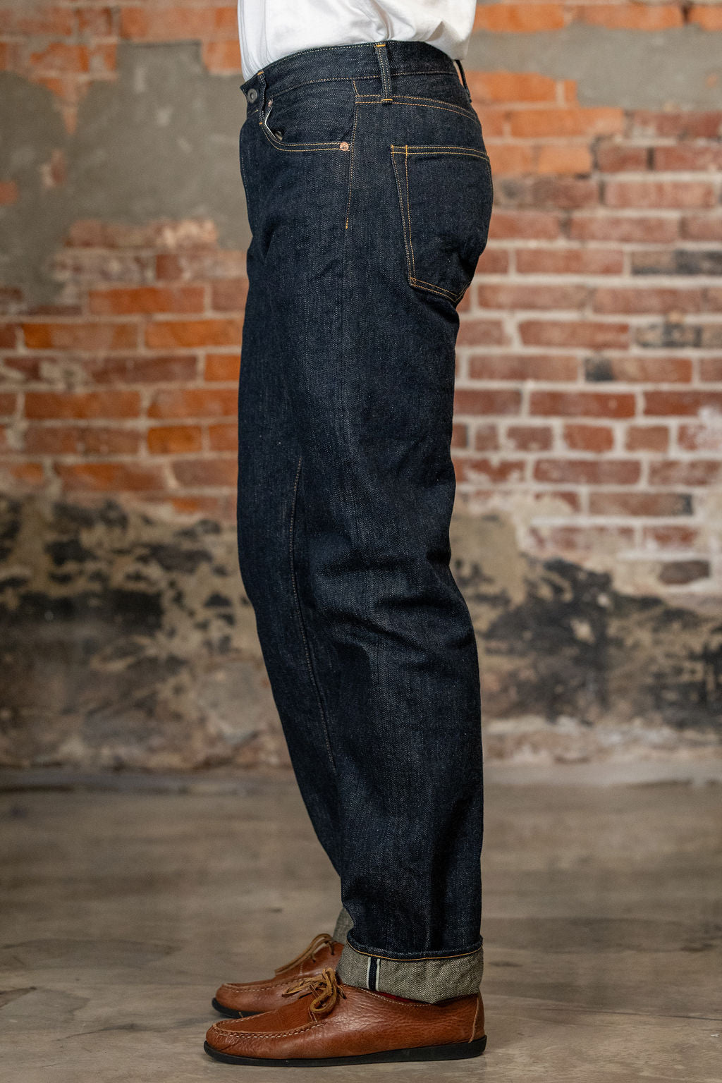 Side view of the Oni Denim 288-GC15 - 15oz Regular Straight Green Cast Denim