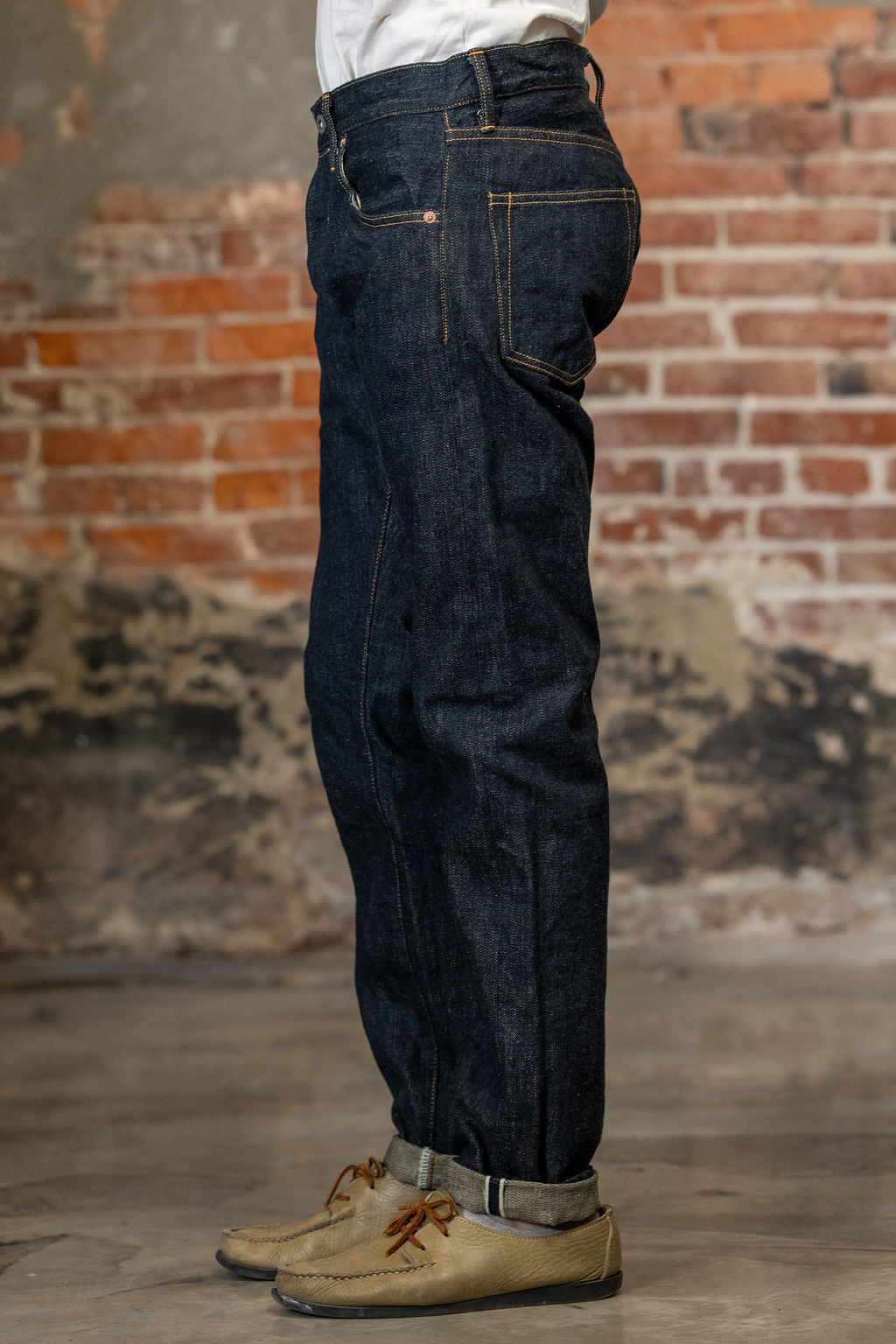 Side view of the  Oni Denim 622-GC15 - 15oz Relaxed Tapered Green Cast Denim