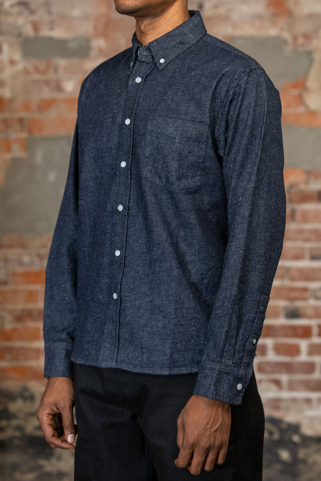 Side view of the 3sixteen Denim Button Down in Snow Slub Denim