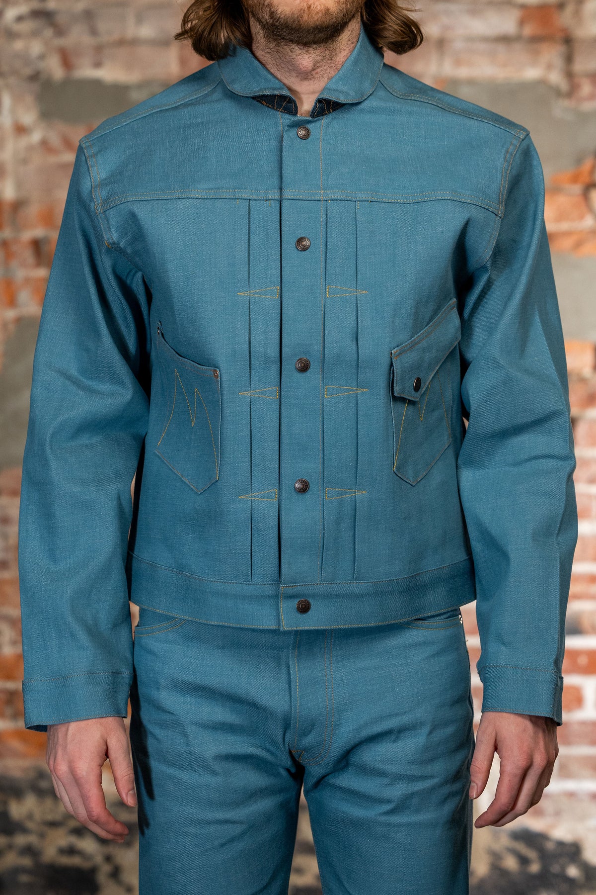 Light blue denim jacket front view on model