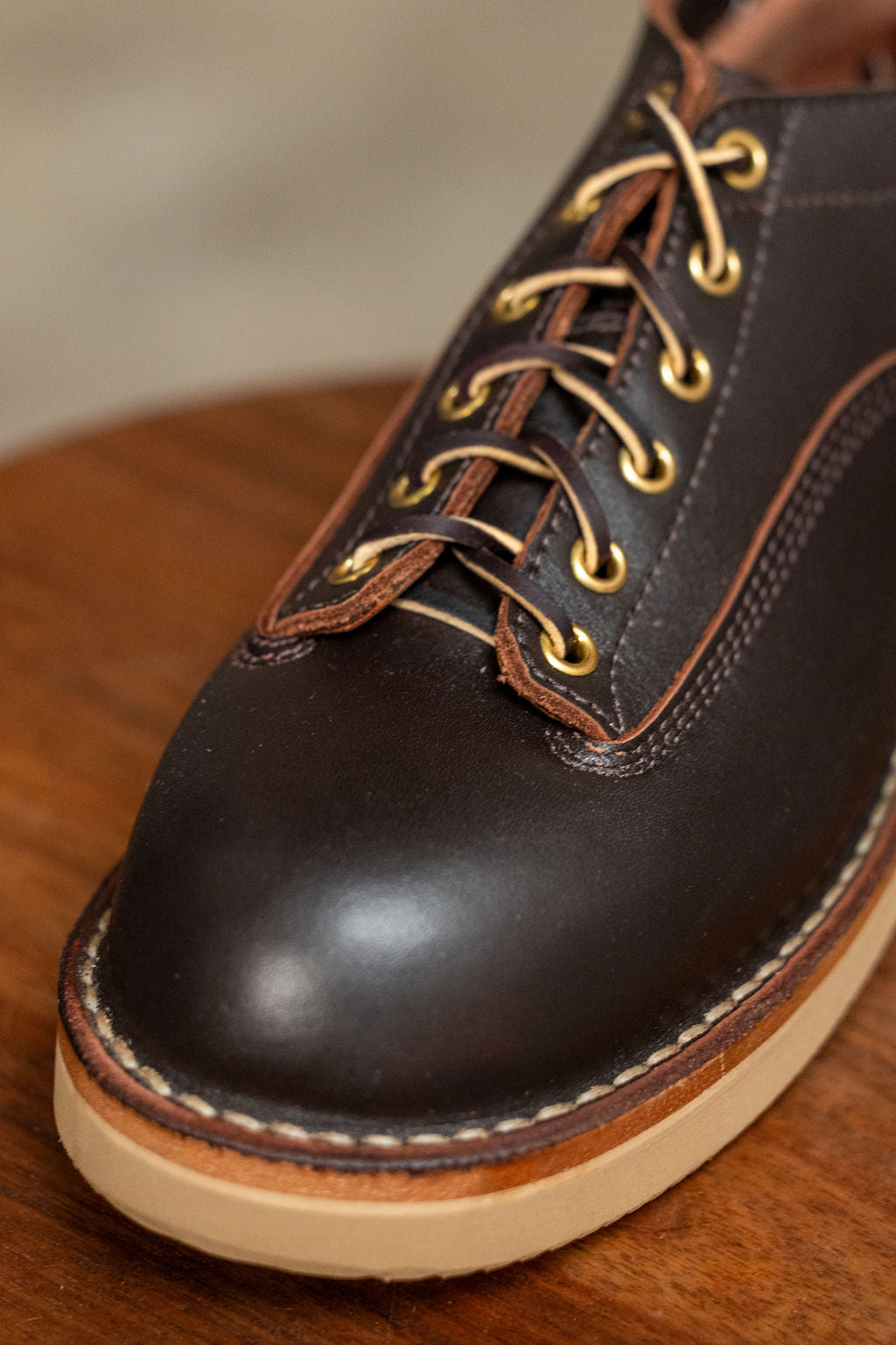 White's Boots x Franklin & Poe LTT Oxford - Brown Dress on wooden stool close up on toe  laces 