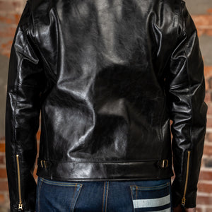 Model wearing back leather jacket from the back.