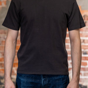 Faded black premium t-shirt front view on model