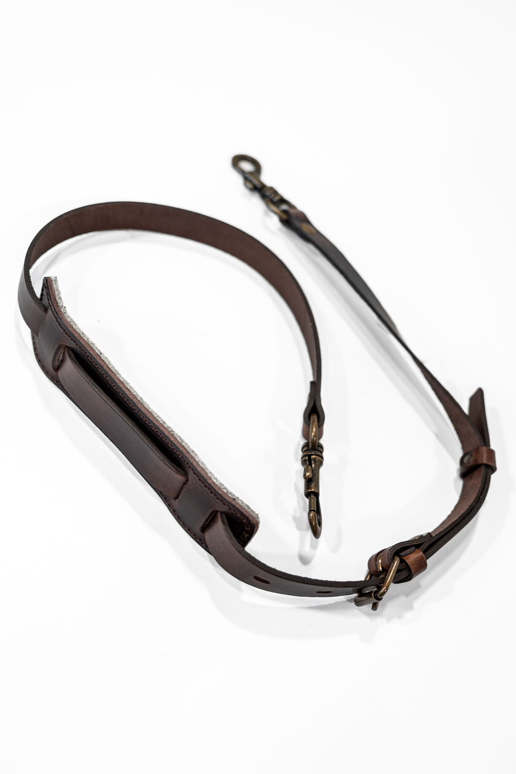 Brown leather strap with trigger hooks top side