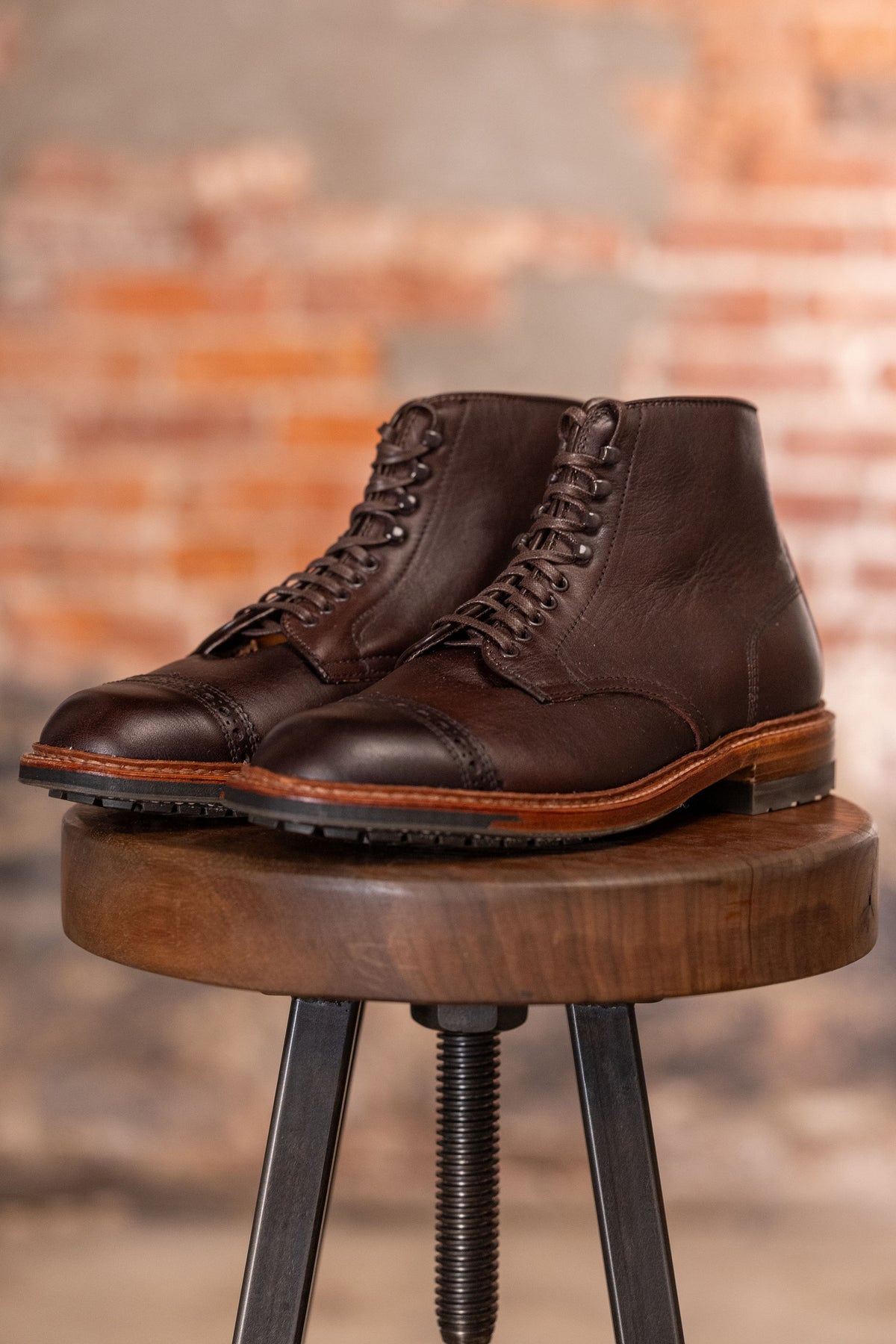 Brown leather cap toe boots front / side view