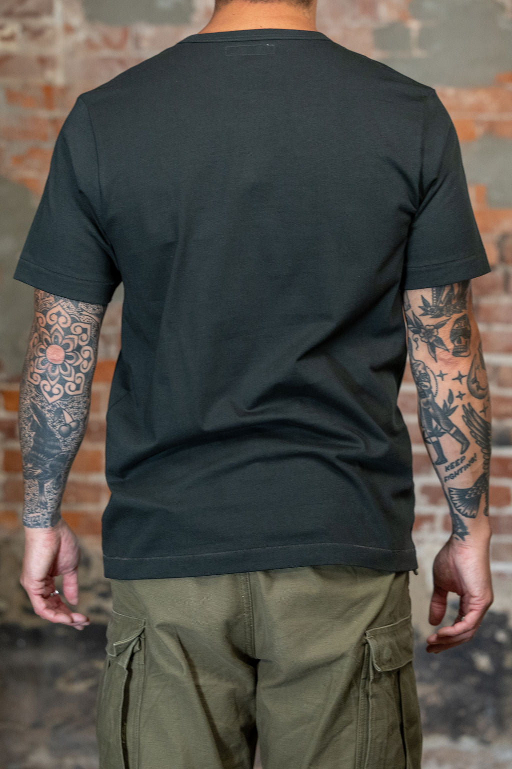 Rear view of the Merz b. Schwanen 2M15 Vintage Machine Refined Classic Fit T-Shirt in Forest