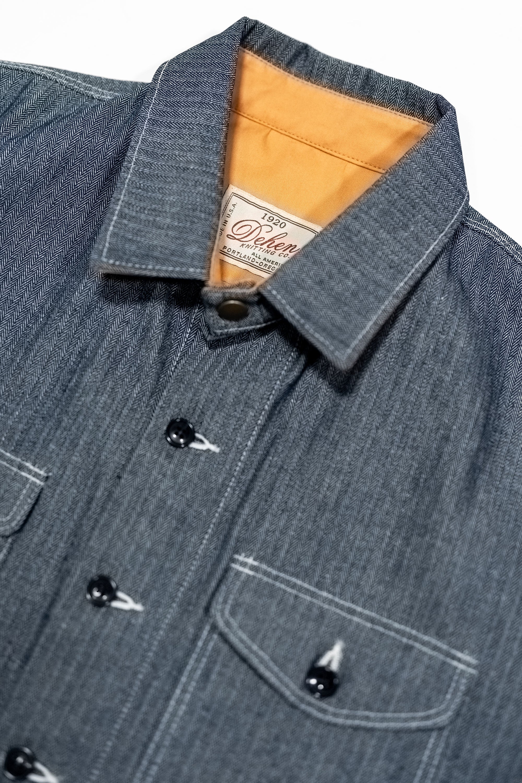 Dehen 1920 Crissman Overshirt - Indigo Herringbone Bull Denim on laid flat close up on collar