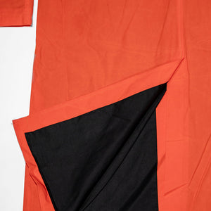 Hansen Garments Morten Long Coat - Waxed Orange laid flat. Details on back slit at bottom of the jacket