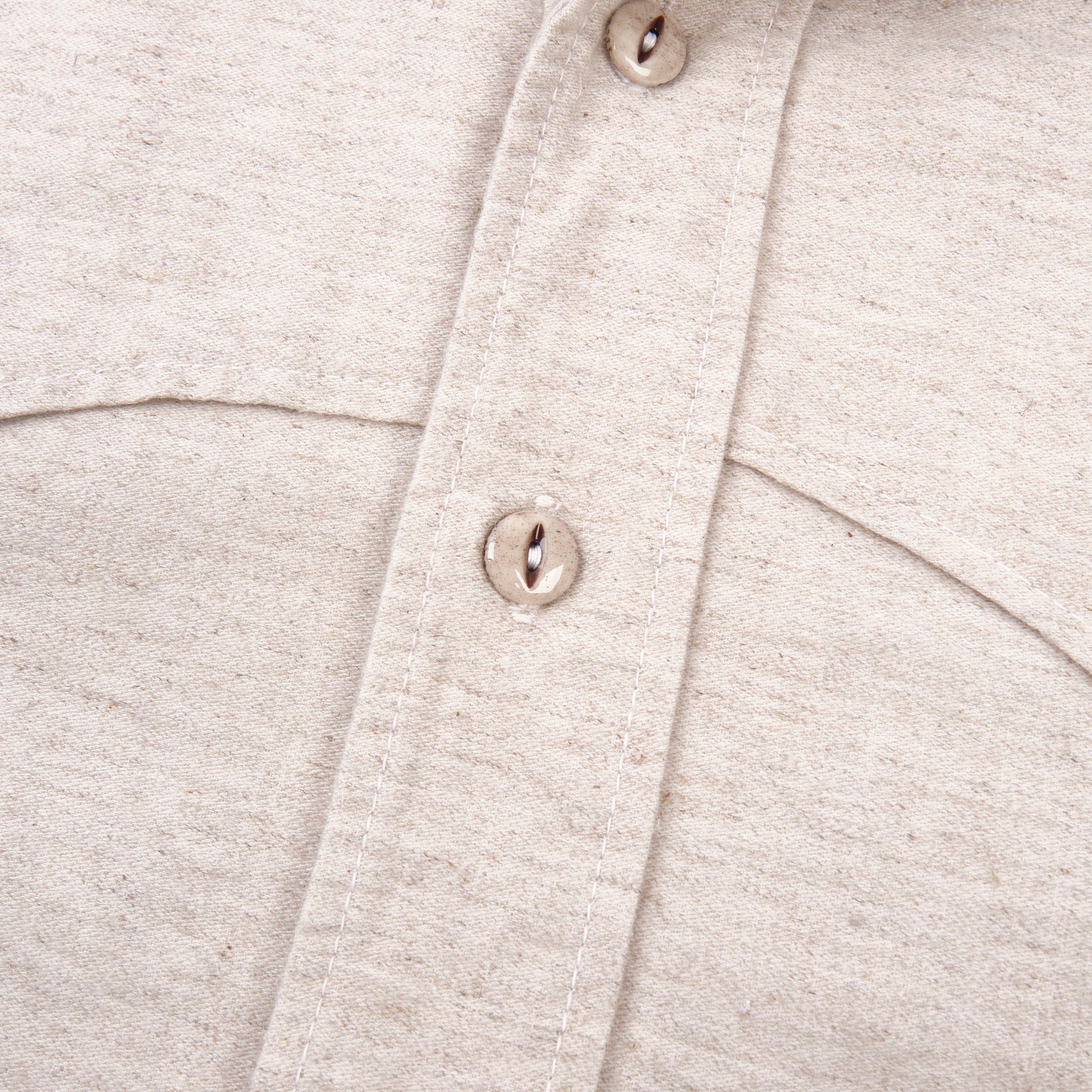 Freenote Cloth Huntsman - Natural Nep laid flat close up on buttons 